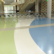 Green and blue designs on a durable linoleum floor in Conneticut
